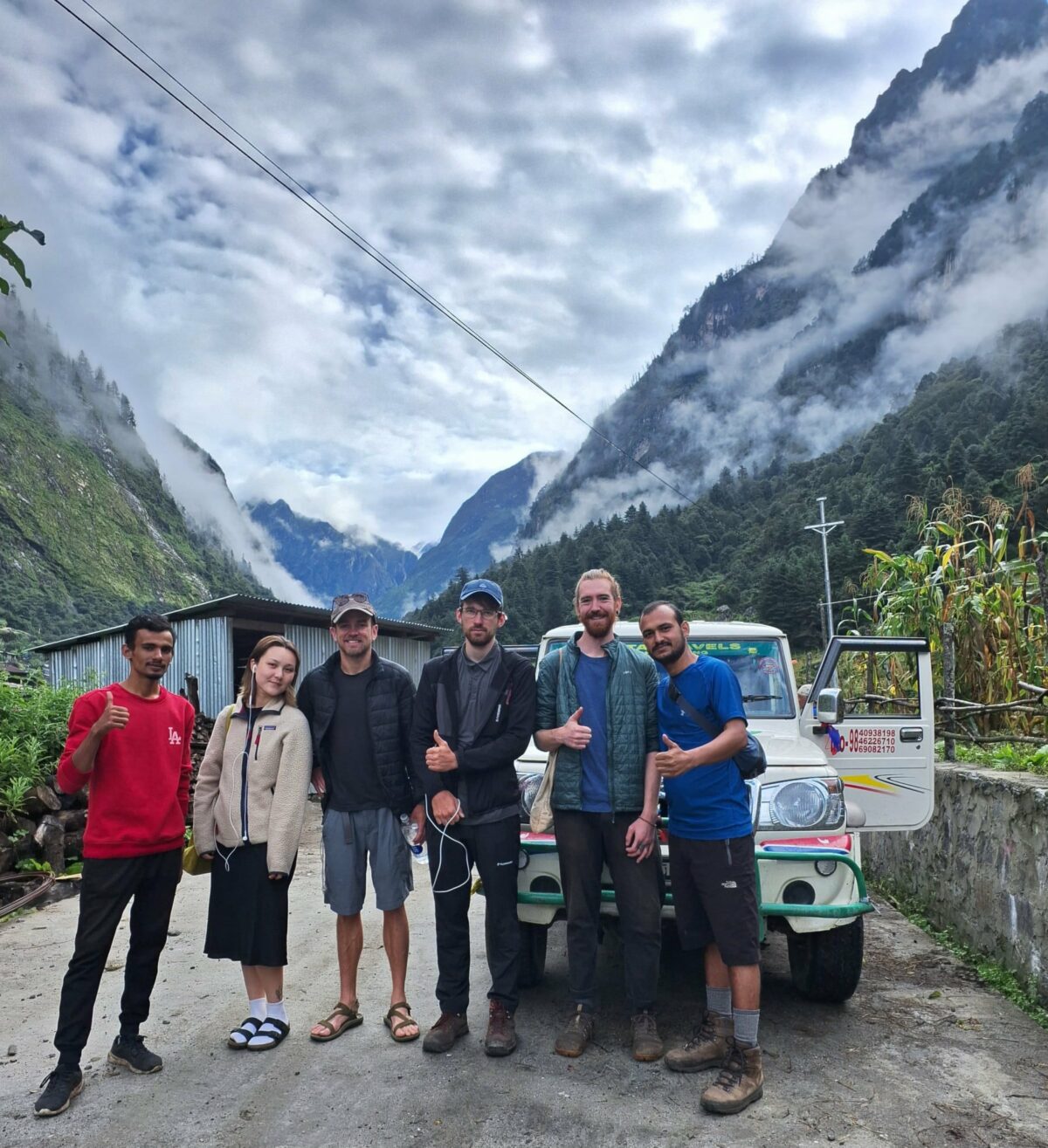 Manaslu Circuit Trek Transport – Getting In and Out With a group infront of Jeep in Dharapani
