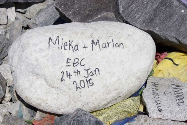 25 Things To Do During Everest Base Camp Trek Mieka and marlon name on the stone at Everest Base Camp Trek
